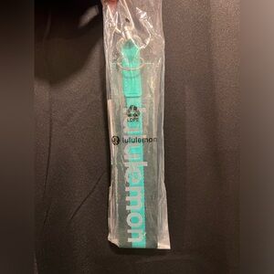 Lululemon blue green Keychain new in bag with tags